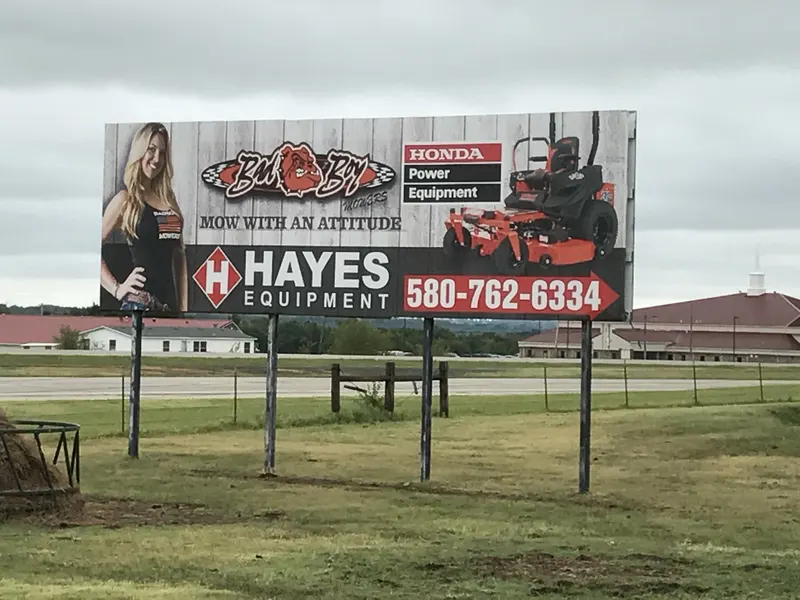 Hayes Equipment billboard for Bad Boy Mowers and Honda Power Equipment, Mow With an Attitude, 580-762-6334