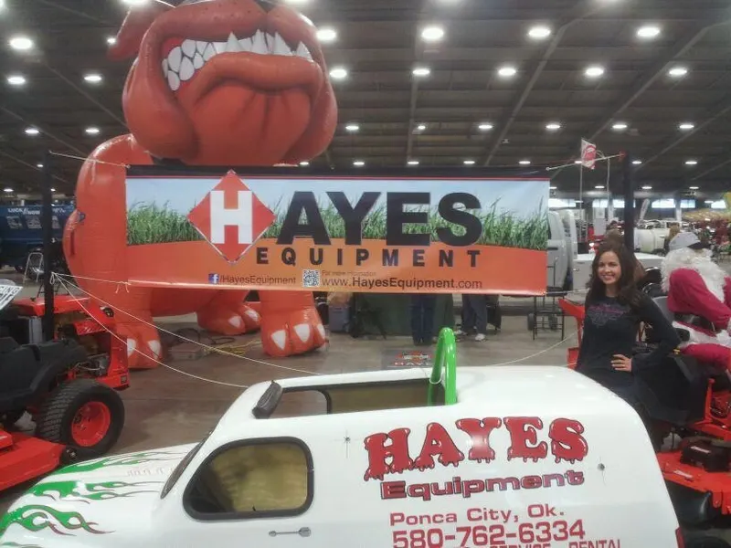 Hayes Equipment trade show booth with a giant inflatable Bad Boy bulldog and banner
